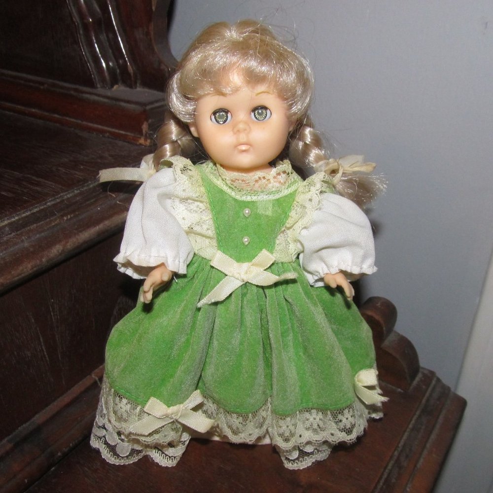 Vintage Ginny Doll with braids in Green, velvety dress